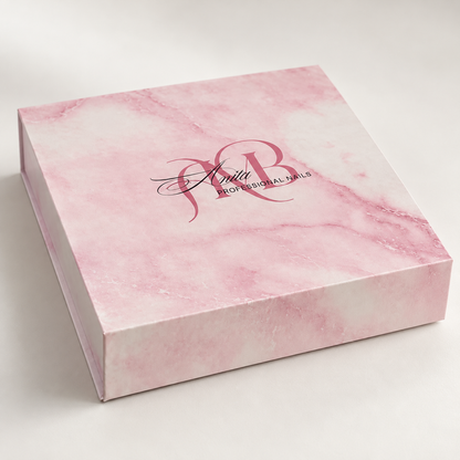 Caja de mármol rosa cerrada con el monograma de Anita Professional Nails